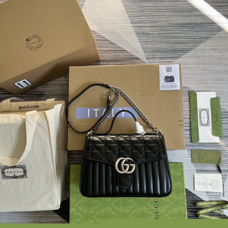 G*u*i top handle bags